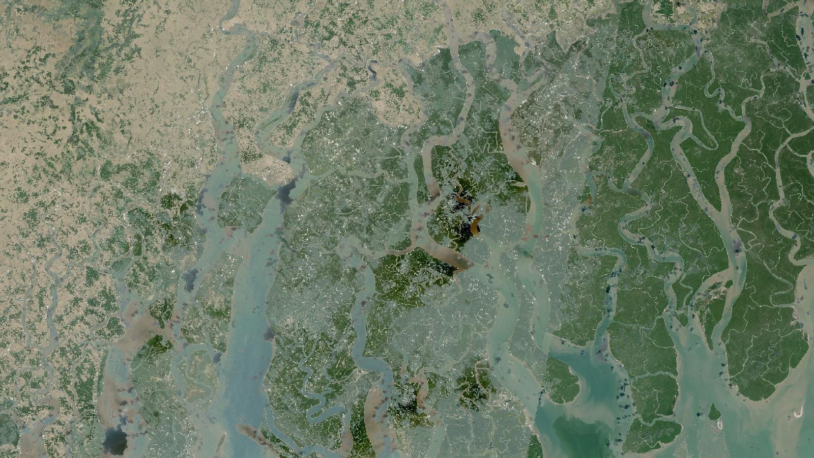 View of Earth from space with glowing connected lights, evoking Google Earth Engine planetary-scale cloud processing of satellite data